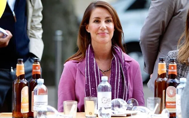 Princess Marie wore a new pink coat from Stine Goya, and ankle boots by UFO. She wore a necklace by Christine Hvelplund