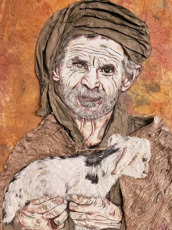paper portrait of elderly man holding lamb