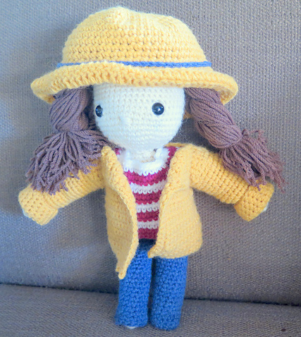 Crochet pattern amigurumi doll girl with yellow hat and coat