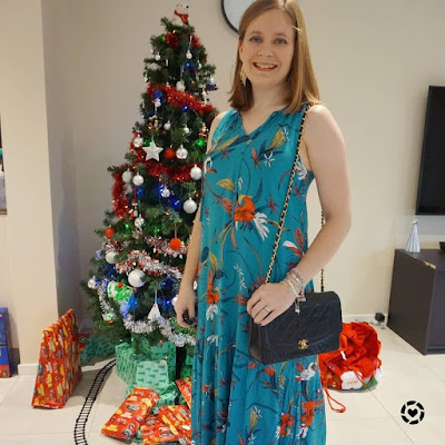 awayfromtheblue Instagram | kmart tropical floral print maxi dress with gold earrings silver bracelets and vintage Chanel flap bag for Christmas day