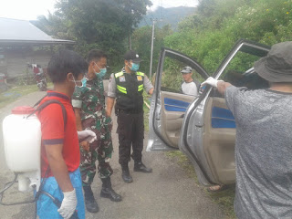 Personil Polsek Simbuang Ikut Cegah Corona di Wilayah Kecamatan Masanda