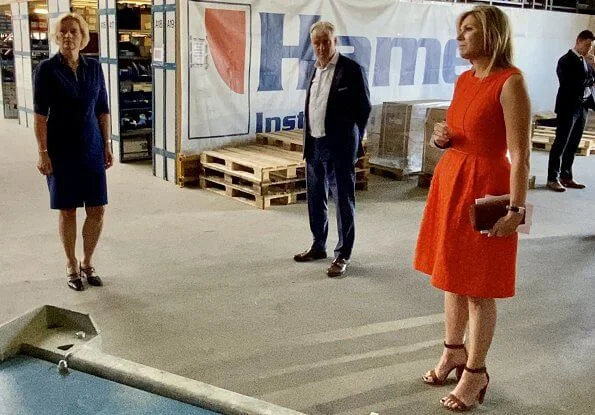 Queen Maxima wore a Natan summer dress in orange. The Queen visited technology facility TechnoHUB in Woerden