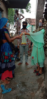 trible-girl-helping-villegers
