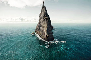 The Biggest Mountain Island In The Blue Water hd Wallpapers For Android
