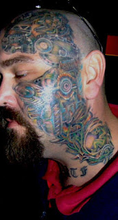 Biomech Face Tattoo Design