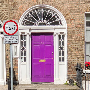 Purple Georgian door on Leeson Street Lower in Dublin Ireland