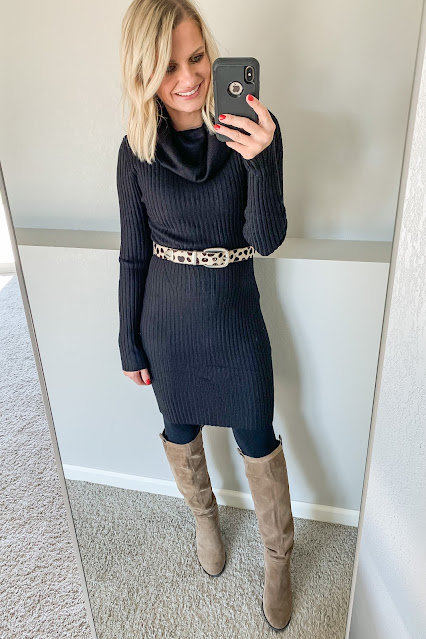 Black sweater dress with knee high boots