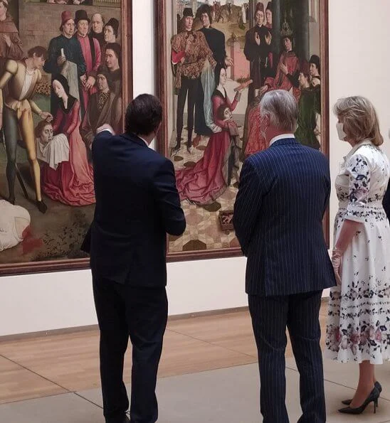 During her visit to the Old Masters Museum, Queen Mathilde wore a new floral print cotton shirt dress by Erdem