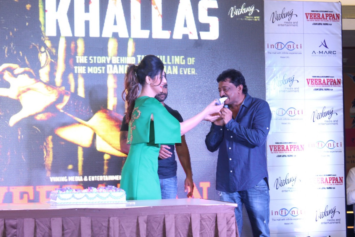 Zareen Khan Displays Her Sexy Legs In a Green Short Dress At The â€œKhallasâ€ Song Launch From Film Veerappan