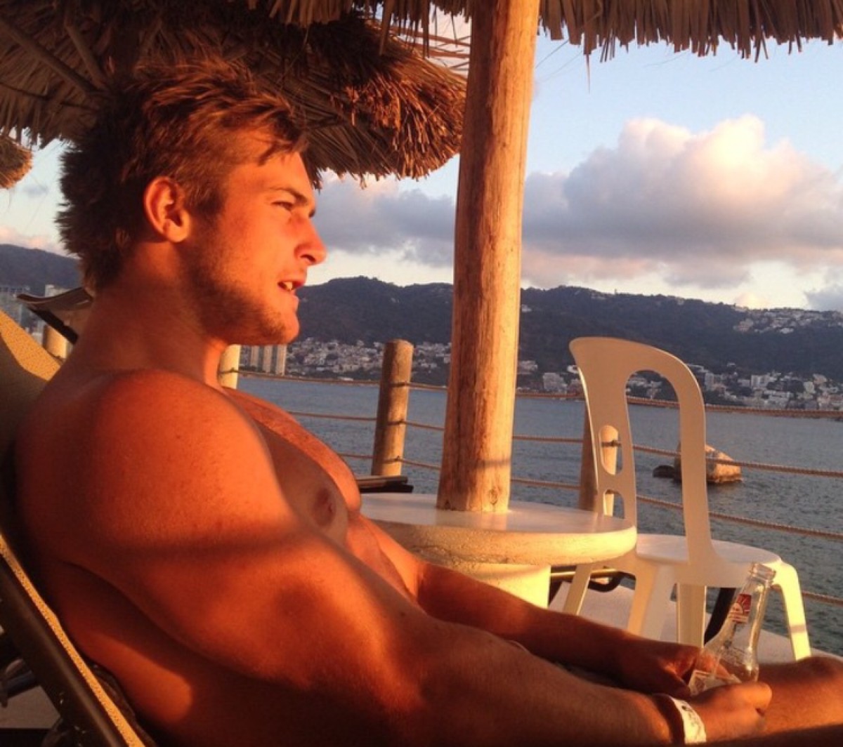 handsome-fit-shirtless-frat-bro-drinking-watching-sunset-straight-beefy-college-hunk