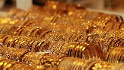 تفسير حلم بيع الذهب للعزباء أو بيع خاتم ذهب أو بيع حلق ذهب في المنام
