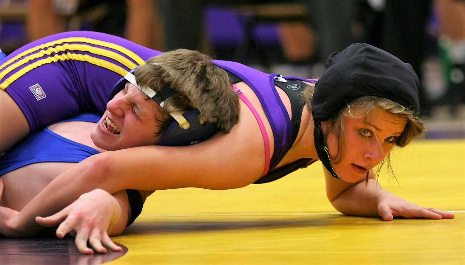 Great moments on the mat - female wrestlers kicking guys' asses.