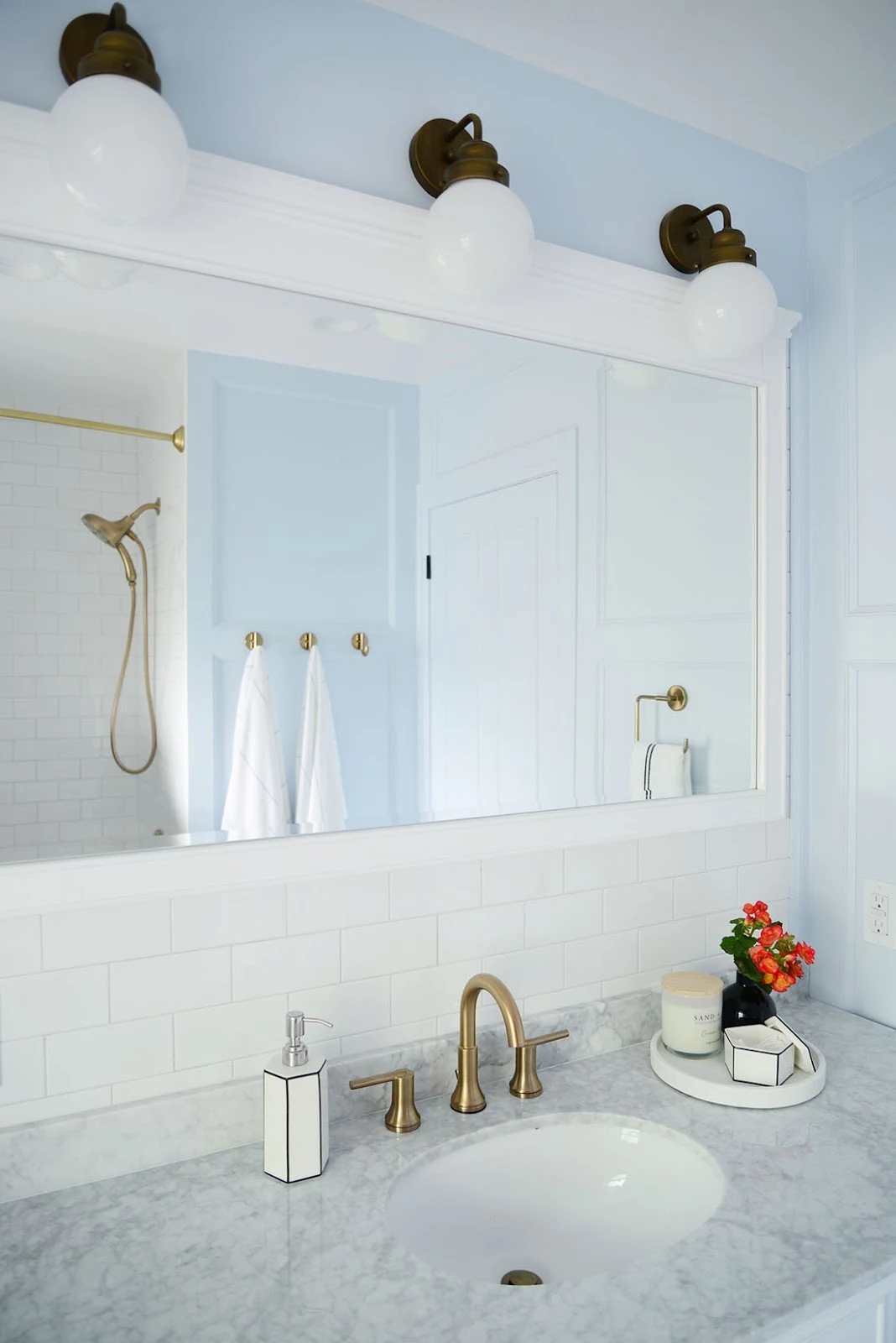 french style bathroom, french country bathroom, home depot bathroom remodel, light blue bathroom, single sink white vanity, globe sconces