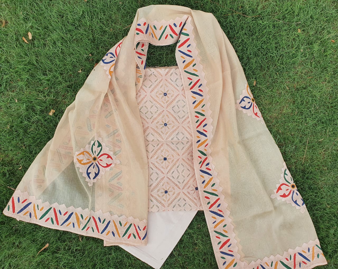 Applique dress materials with embroidery