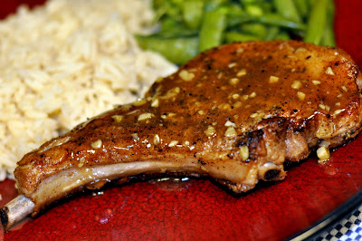 Skillet Pork Chops with Orange Garlic Sauce - Photo by Michelle Judd of Taste As You Go