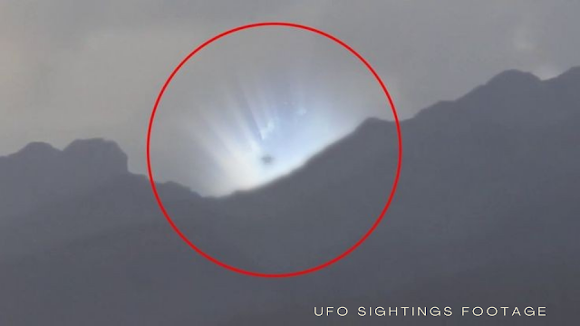 UFO explodes right on a mountain.
