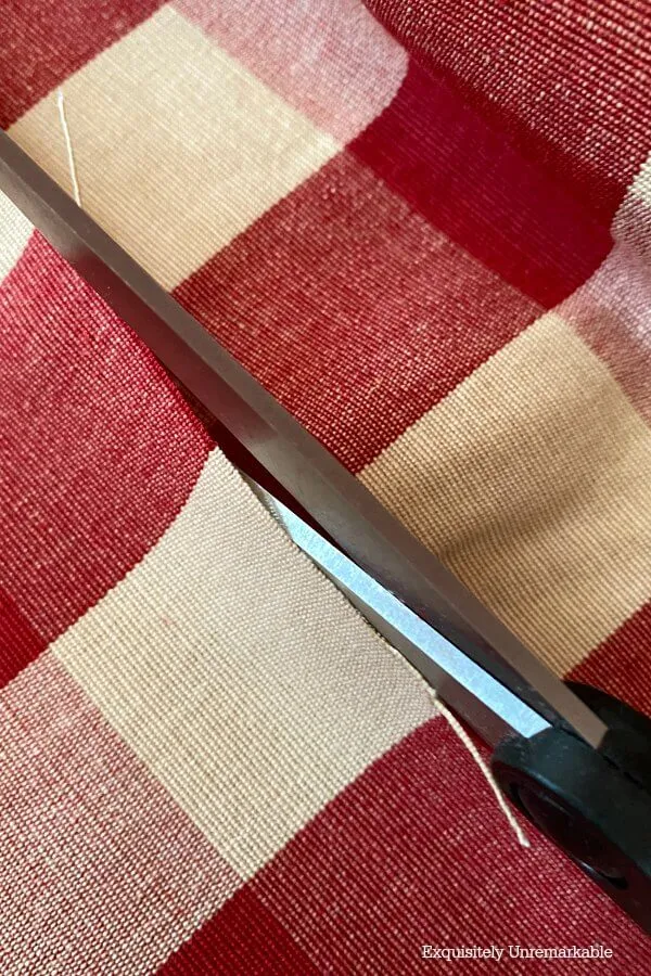 Cutting Red Checked Fabric