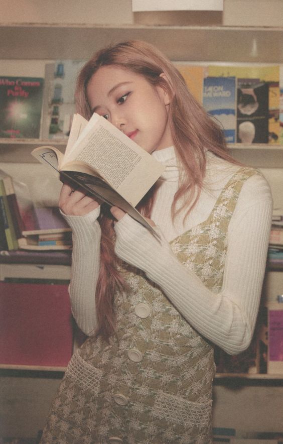 Rosé reading book [Source: BLACKPINK Welcoming Collection Photobook]