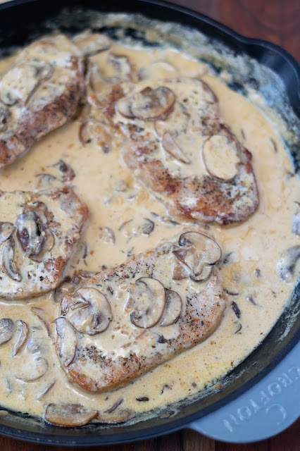 The finished Pork Chops with Creamy Mushroom and Garlic Sauce in the pan. 