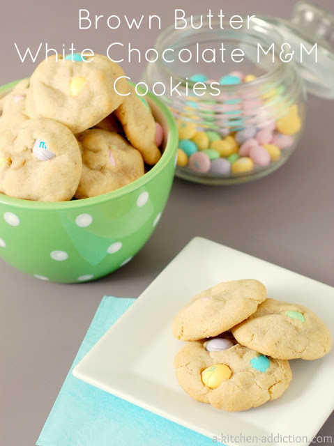 Brown Butter White Chocolate M&M Cookies. Easter Candy Dessert Roundup the perfect way to enjoy your pastel Easter Candy from the Easter Egg Hunt. You will love these Easter Candy Dessert Recipes on www.Embellishmints.com