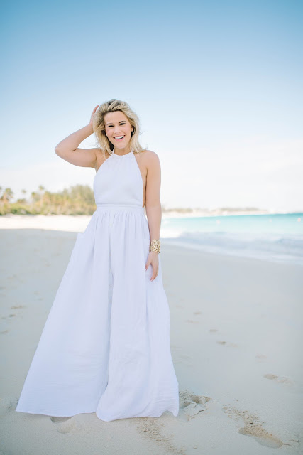 white maxi dress on the beach 