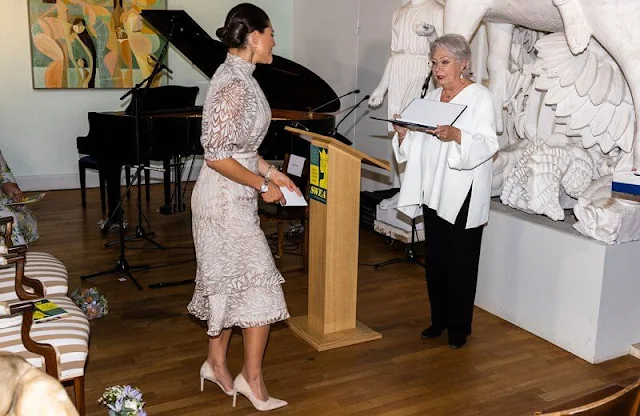 Crown Princess Victoria wore a new leaf patterned midi dress by Valerie. Princess Christina. Kreuger Jewellery feather earrings