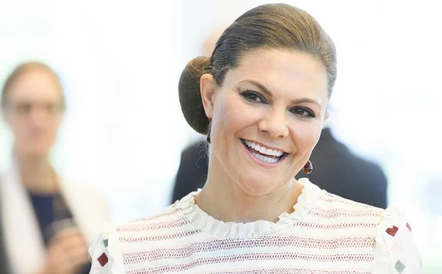 Crown Princess Victoria wore a comfy maisy dress from By Malina. Caroline Svedbom burgundy drop earrings. Rizzo Azelia pumps