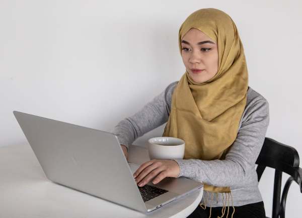 Muslimah using Laptop