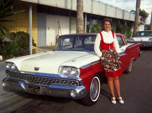 Her new Ford matches her waitress uniform. 1959