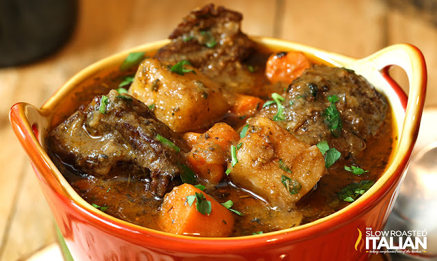 Vegetable Beef Soup homemade soup with beef, carrots, and potatoes in a red bowl