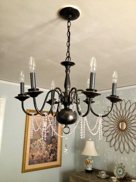 A chandelier redo finishes the dining room...