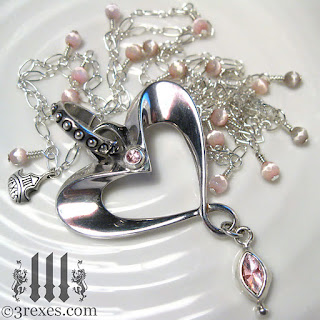 silver heart necklace with pink drops