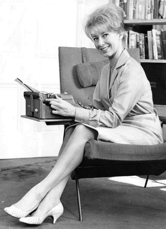 Shirley Abicair with her Hermes 2000 portable typewriter. 