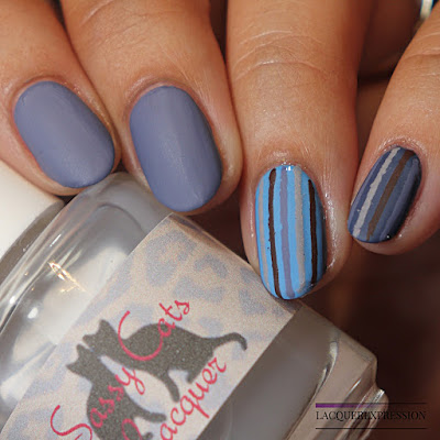DIY vinyl stripes matte blue nail art manicure using gray blue, baby blue, brown, and grey neutral colors for fall