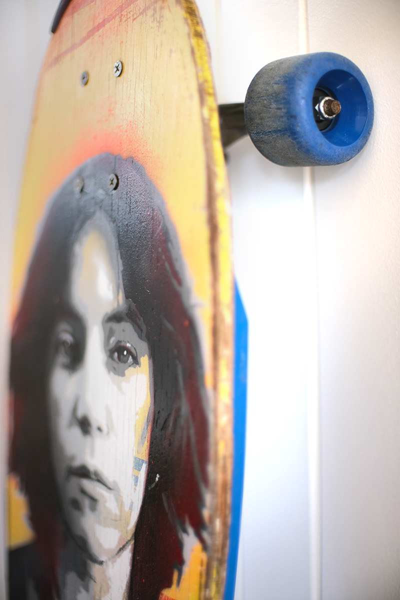 A skatedeck artwork of Patti Smith created by artist James Straffon
