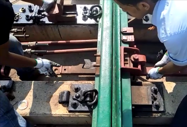 Inserting Lock slides into the groove of the stock rail bracket (under the rail)