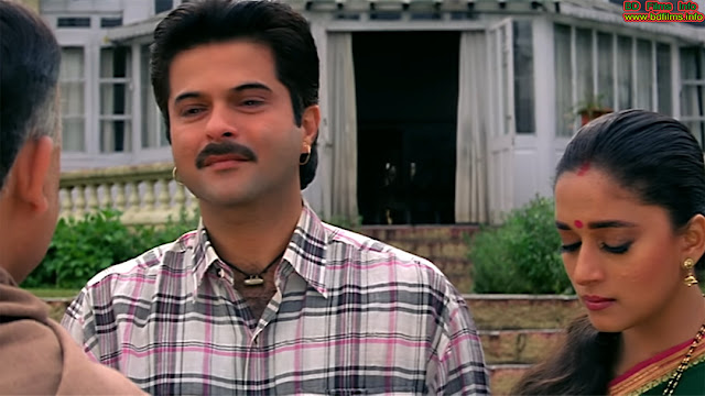 Anil Kapoor and Madhuri Dixit in Beta (1992) Movie Beta is an Indian Comedy melodrama film directed by Indra Kumar in 1992. The film is produced by Indra Kumar himself and Ashok Thakeria. It is starred by three actor and actress Anil Kapoor, Madhuri Dixit and Aruna Irani in the lead roles. In other supporting roles, Laxmikant Bedre, Anupam Kher, Priya Arun, Akash Khurana, Kunika, Adi Irani , Bharat Achrekar and some others have played. Beta is one of the most grossing films then in India. It’s a comedy melodrama and most popular film. Especially, there are ten popular songs in the film. So, it’s called musical drama. Many call it musical and comedy melodrama. Above all, “Dhak Dhak Karne Laga” is the most popular song in the film. It’s also one of the most popular and best songs in India. Actually, the film is an official remake. The film story is taken from the Kannada novel Mallammana Pavada written by B. Puttaswamayya. The first film, a Telugu movie is directed from this story in 1955. About ten films have been made based on this story. The Telugu film Ardhangi (1955) is directed by P. Pullaiah, The Tamil film Pennin Perumai (1956) is directed by P. Pullaiah, The Hindi film Bahurani (1963) is directed by T.Prakash Rao, The Kannada film Mallammana Pavaada (1969) is directed by Puttanna Kanagal, The Bengali film Swayamsiddha (1975) is directed by Sushil Mukherjee, the Hindi film Jyothi (1981) is directed by Pramod Chakravorty, the Tamil film Enga Chinna Rasa (1987) is directed by K. Bhagyaraj, then the Hindi film Beta (1992) is directed, The Telugu film Abbaigaru (1993) is directed by E.V.V. Satyanarayana, the Kannada film Annayya  (1993) isdirected by D. Rajendra Babu and the Oriya film Santana (1998) is directed by Mohammad Mohsin. All these films are made based on the same story from the Kannada novel. Beta (1992) is one of the great works of Indra Kumar. Actually, he directed several high grossing films but Beta became very popular for its music and melodrama specially the story. It’s an attractive story features the three lead characters Raju as son of Laxmi (Anil Kapoor), Saraswati as wife of Raju (Madhuri Dixit) and Laxmi as step mother of Raju (Aruna Irani). Raju is very fond of his step mother. But he never sees her as his step mother. He thinks mother is above of all things in the world. So, he never suspects his mother. But his mother makes him illiterate for occupying his entire properties. But after his marriage, Raju’s wife Saraswati wants to save him from all these corruptions and oppression attributed on him. Here Saraswati is the savior. In the last some scenes, melodramatic scenes are noticed about them when Raju knew the real state of his step mother by trying to kill his wife. But unfortunately, Raju himself is faced with death after taking the milk mixed with poison. Raju thinks he would give everything if once she asked about that. He does not care about wealth and properties that his father did to be named on him. Beta is also a family drama because the film or story cannot go beyond the family or the house. It’s highly a dramatic film. It is the best of Madhuri Dixit or Anil Kapoor or Indra Kumar. Highly melodramatic acting, popular and attractive background music and popular songs, normal cinematography, attractive and family story, extra ordinary make up and costumes, artistic set and normal editing that have made it best to Indra Kumar and so it is the best of Indra Kumar.