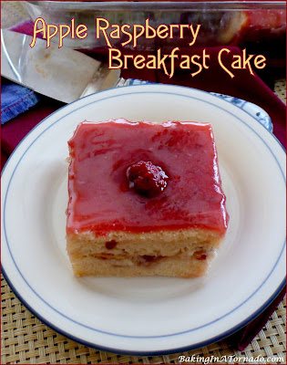 Apple Raspberry Breakfast Cake is a delicious breakfast or snack cake made with chopped apples, swirled with raspberry jam and topped with a raspberry glaze. | Recipe developed by www.BakingInATornado.com | #recipe #cake