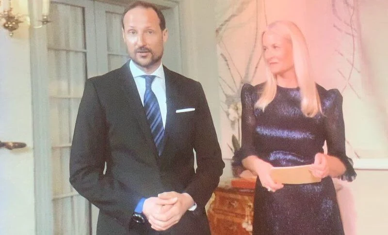 Crown Princess Mette-Marit wore a new Cinderella ruffle-trimmed silk-blend maxi dress by The Vampire’s Wife. Manolo Blahnik