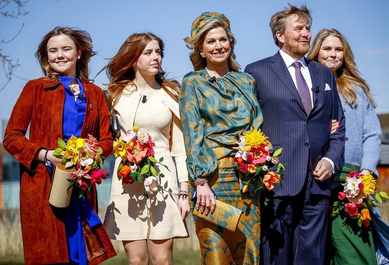 Princess Alexia wore a beige knit cardigan and dress by Maje. Amalia wore a blouse by Natan. Maxima wore a silk skirt and top by Natan