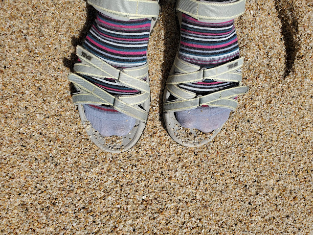 Image of wet feet - in sandals and socks