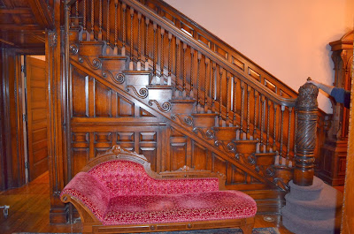 Entryway Stairwell Showing the carving details Photo by Trisha Field