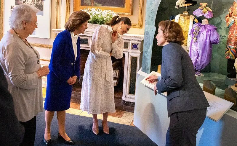 Queen Silvia and Princess Christina. Crown Princess Victoria wore a sheer lace shirt dress and baroque pearl earrings from Cravingfor
