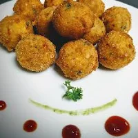 Serving corn cheese balls with tomato sauce for corn cheese balls recipe