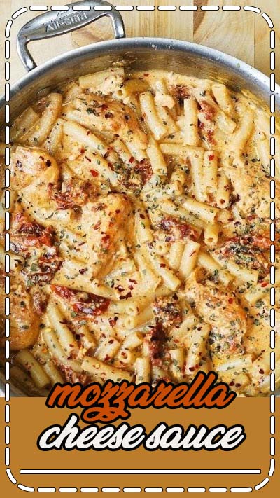 "Chicken with sun-dried tomatoes and penne pasta in a creamy mozzarella cheese sauce seasoned with basil, crushed red pepper flakes." JuliasAlbum.com