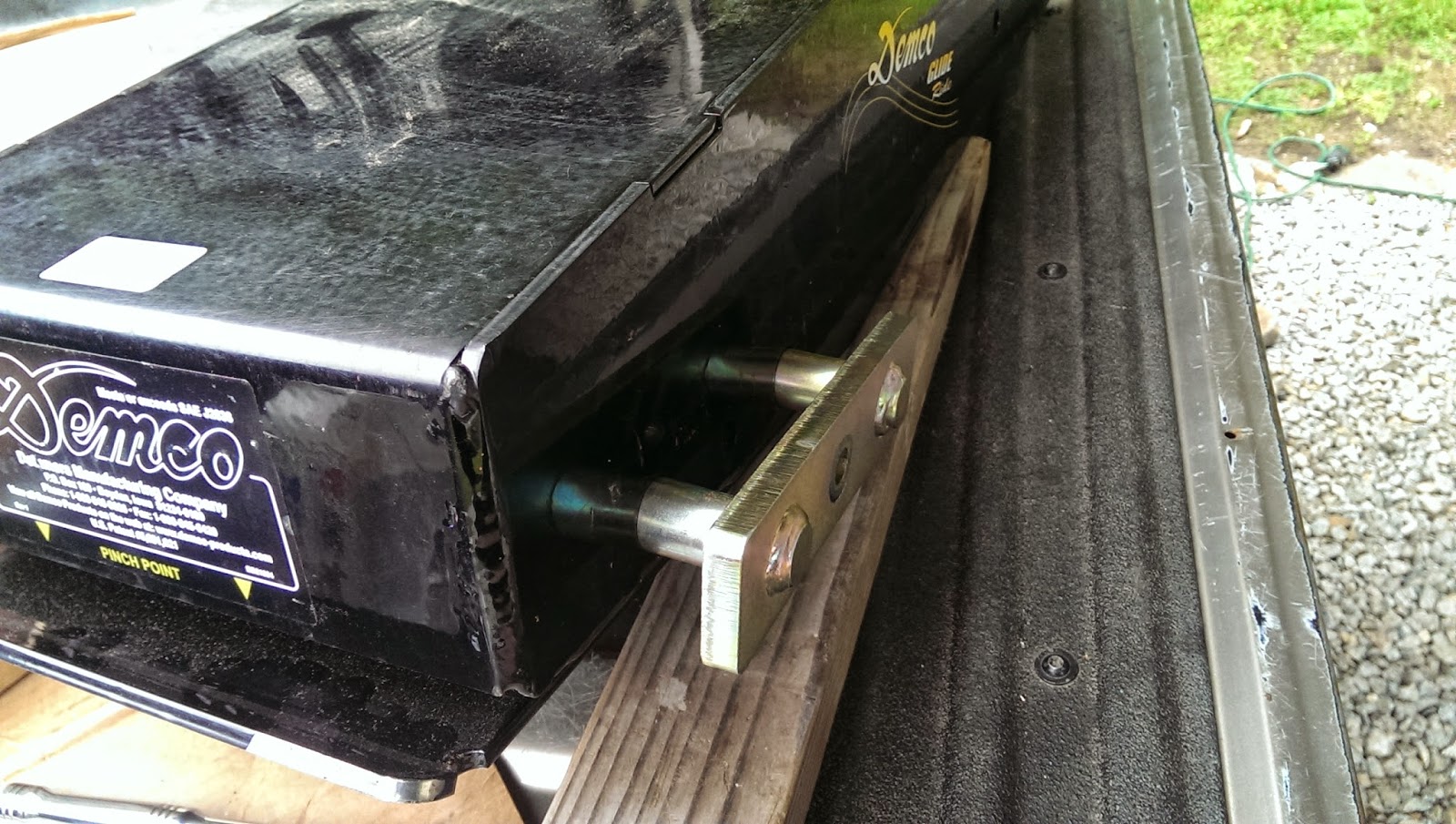 Removing link assembly and king pin plate.