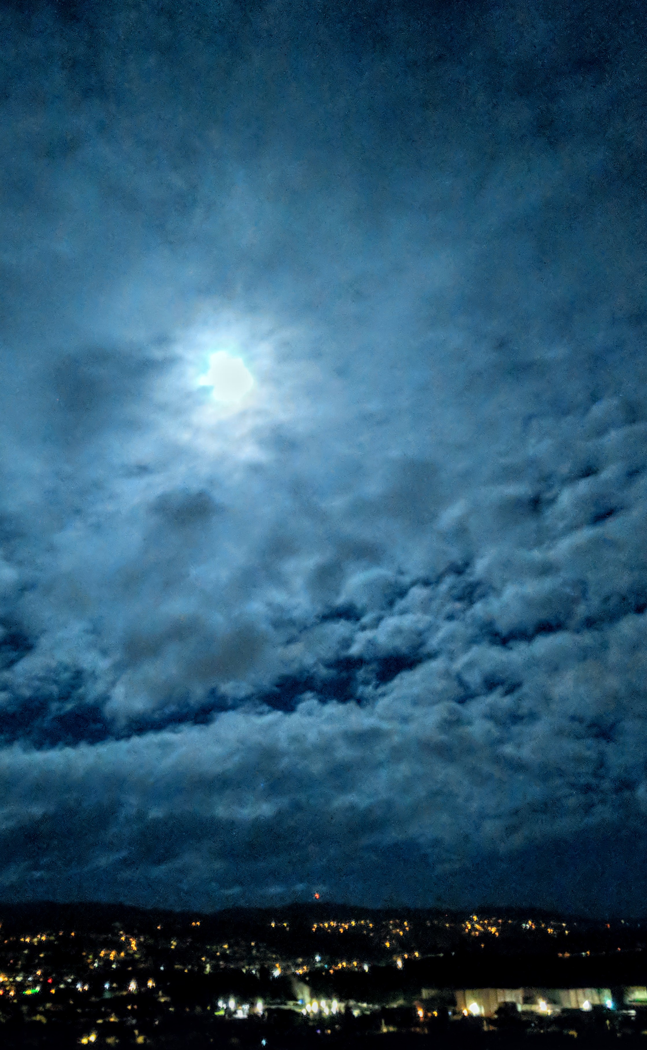 Edited moon and clouds over Wellington