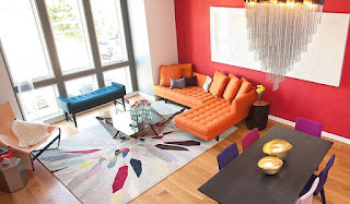 Assorted Modern Sofa Bed for Various Modern Rooms Colorful Sitting Space with Orange Modern Sofa Bed and Blue Bench near Glass Table on Colorful Carpet
