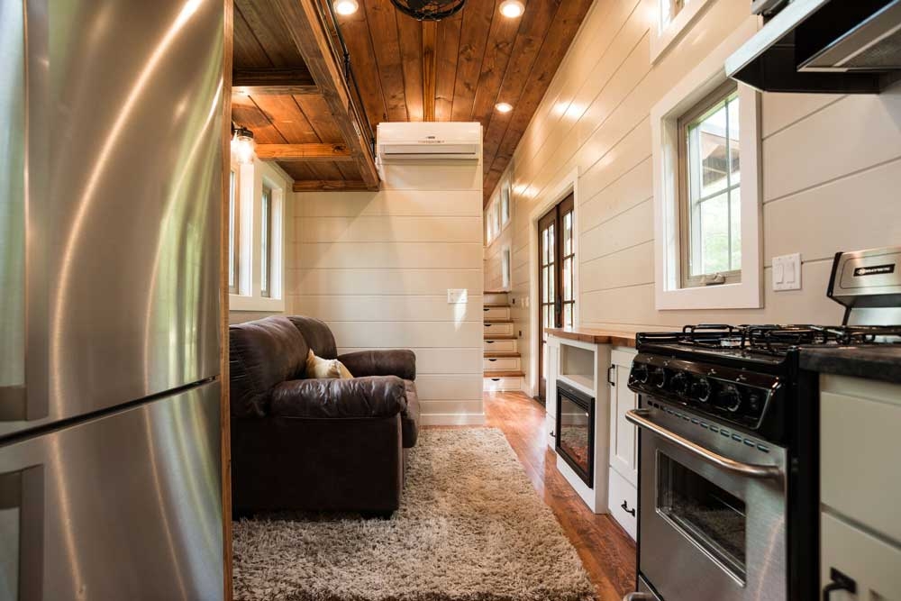 03-Kitchen-and-Living-Room-Timbercraft-Tiny-Homes-Architecture-with-Two-Double-Rooms-Tiny-House-www-designstack-co