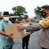 Polres Asahan Bagikan 2000 paket Sembako Kepada Warga Terdampak Covid -19 Di Kabupaten Asahan